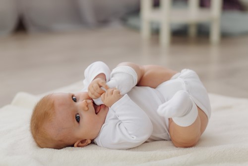 Challenges in Baby's Transition from Rolling to Sitting and Crawling  image