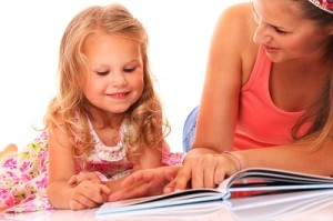 The simple act of reading with your child will help them develop a love of learning